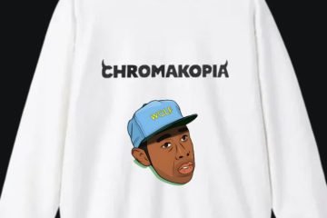 Tyler the Creator wearing Chromakopia tour hoodie on stage